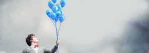 Man with digital marketing balloons